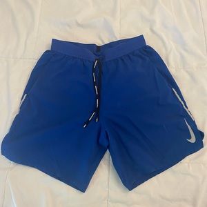 Blue Nike 7” shorts size S